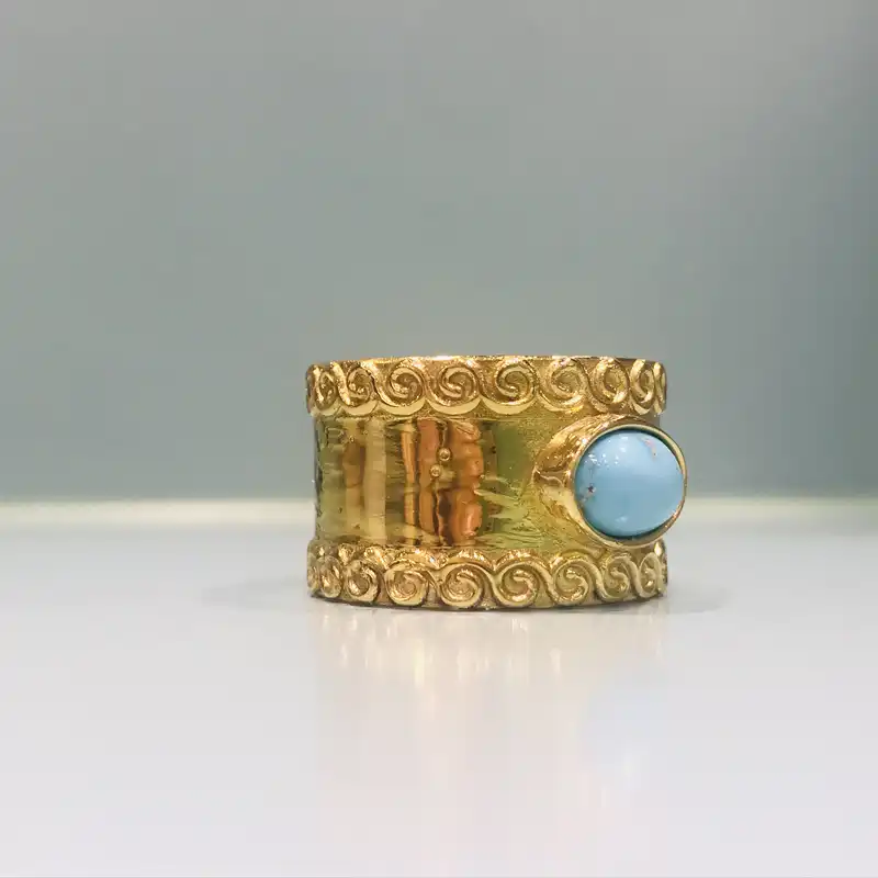 انگشتر نقره زنانه مدل دستساز طرح پنبه ای با فیروزه عجمی نیشابوری