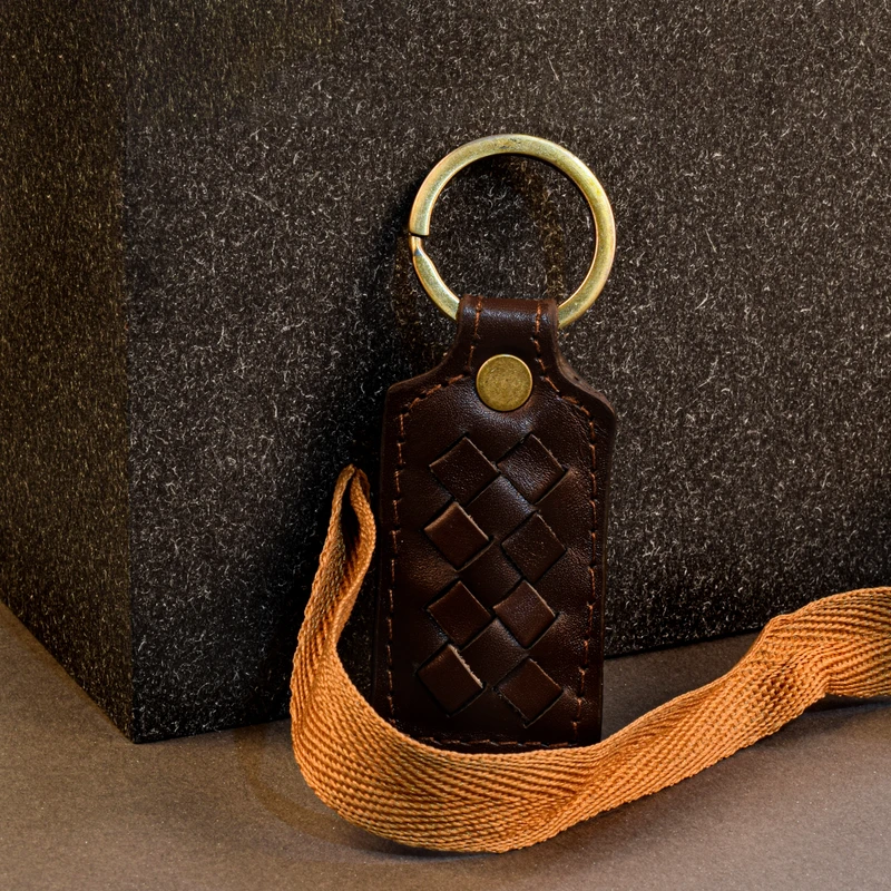 عکس شماره 9 : جاکلیدی چرمینه اسپرت مدل بافت