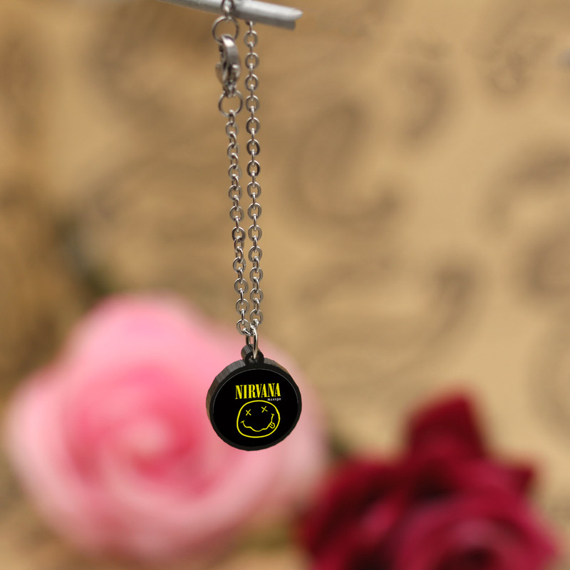 آویز ساعت زنانه ناکسیگو مدل شب تاب طرح Nirvana کد AW7269