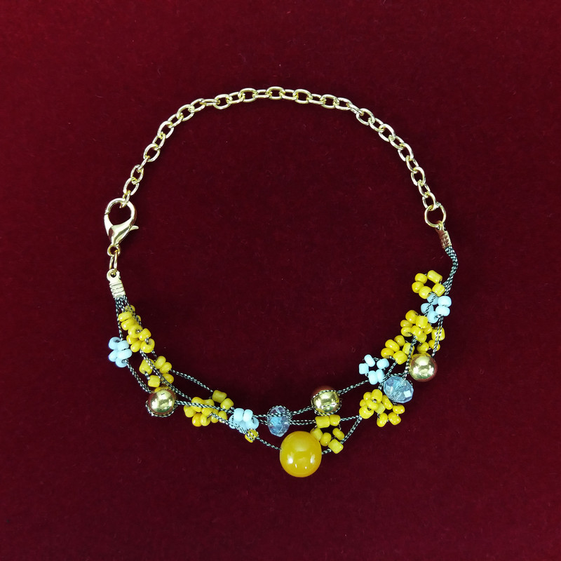 دستبند دخترانه مدل شکوفه پاییز کد NG1087 مجموعه 2 عددی