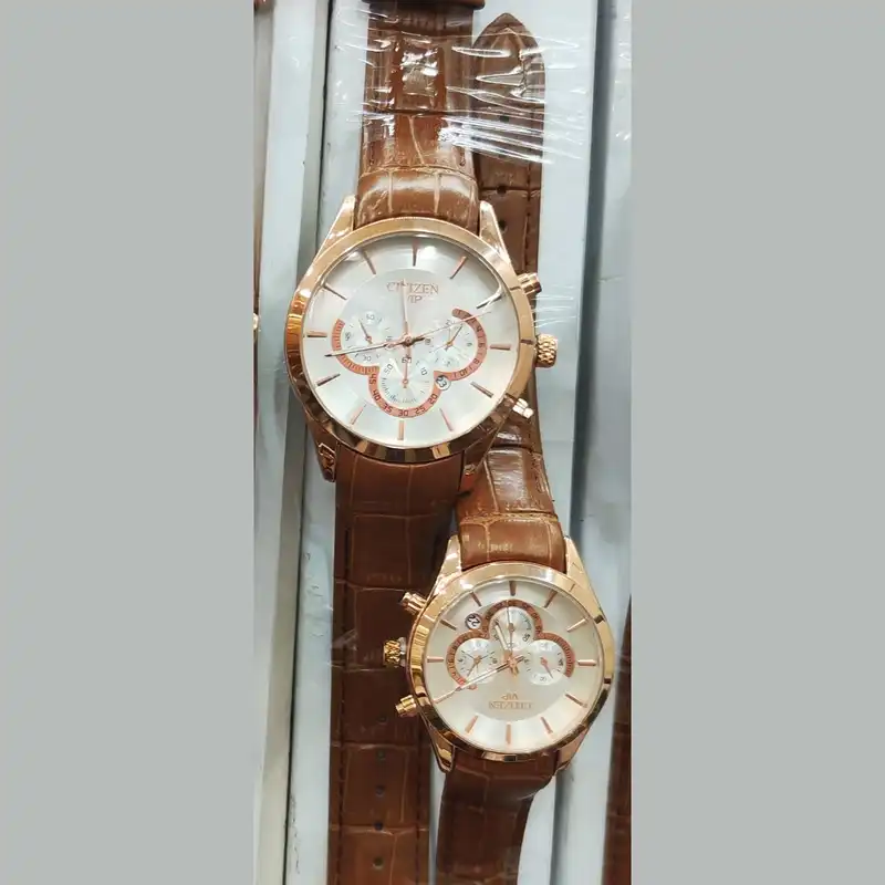 ست ساعت مچی عقربه ای زنانه و مردانه مدل تک موتوره بند چرمی قفل فیکس کد 2