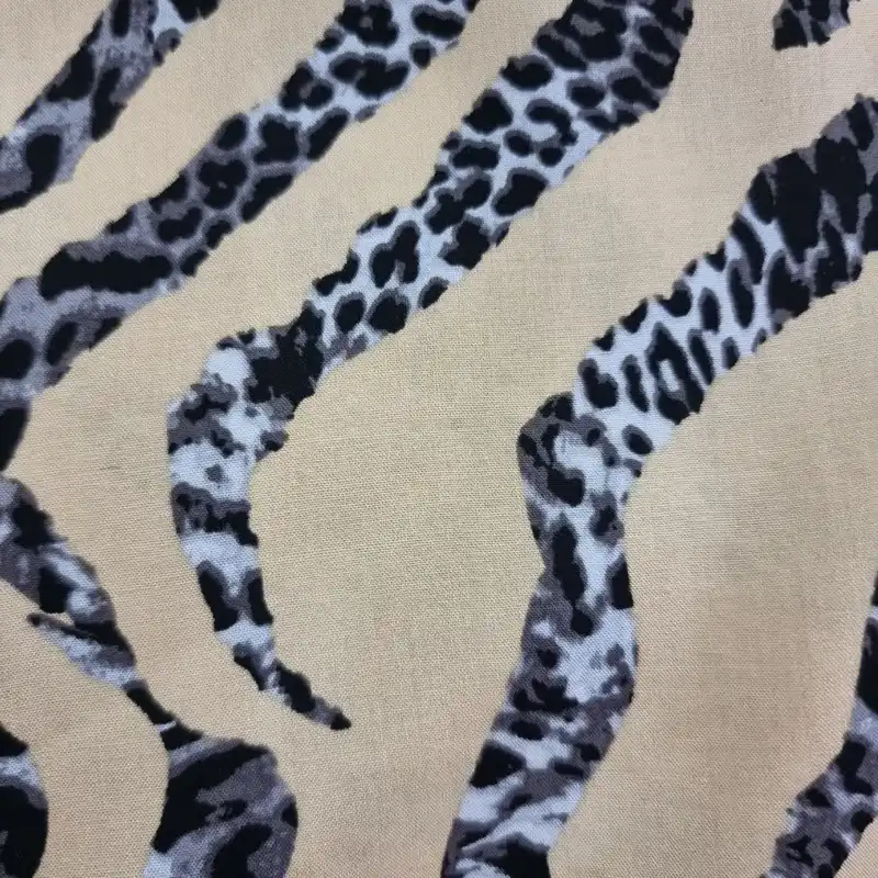 پارچه لباس مدل کودری نخی طرح پوست ماری