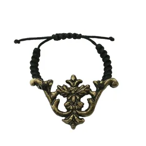 دستبند مردانه مدل گل برنجی کد 701