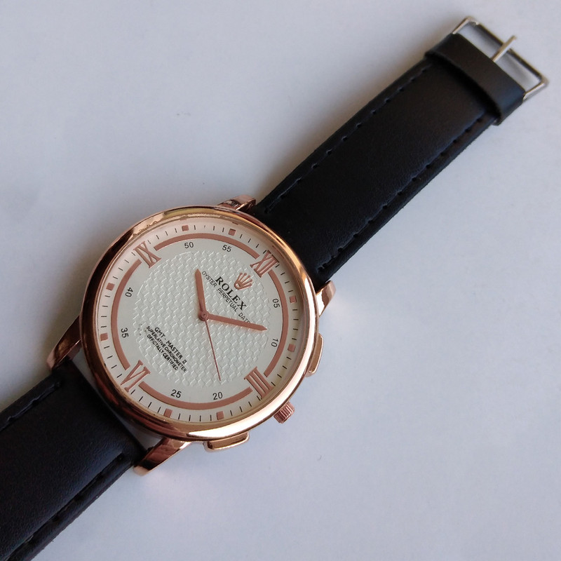 ساعت مچی عقربه ای پسرانه مدل بندچرمی کر 213 ساعت مچی عقربه ای پسرانه مدل بندچرمی کر 213