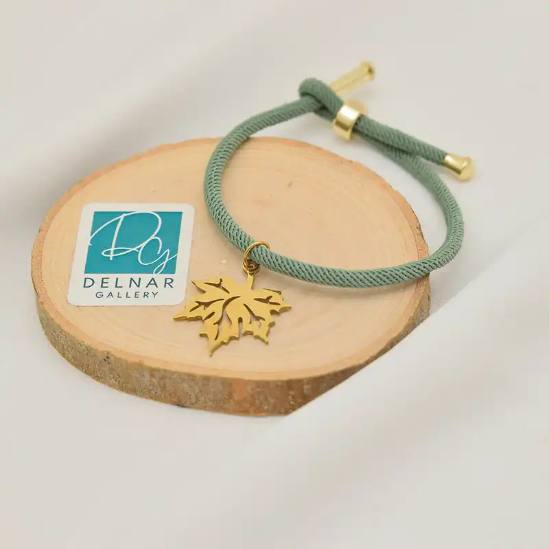 دستبند زنانه دلنار گالری مدل آسانسوری کنفی برگ پاییز