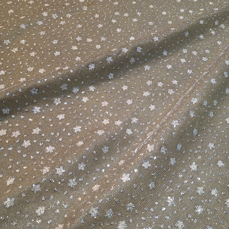 پارچه لباس عرض ۱.۵ متر مدل لمه گلس ستاره ای رنگ کرم