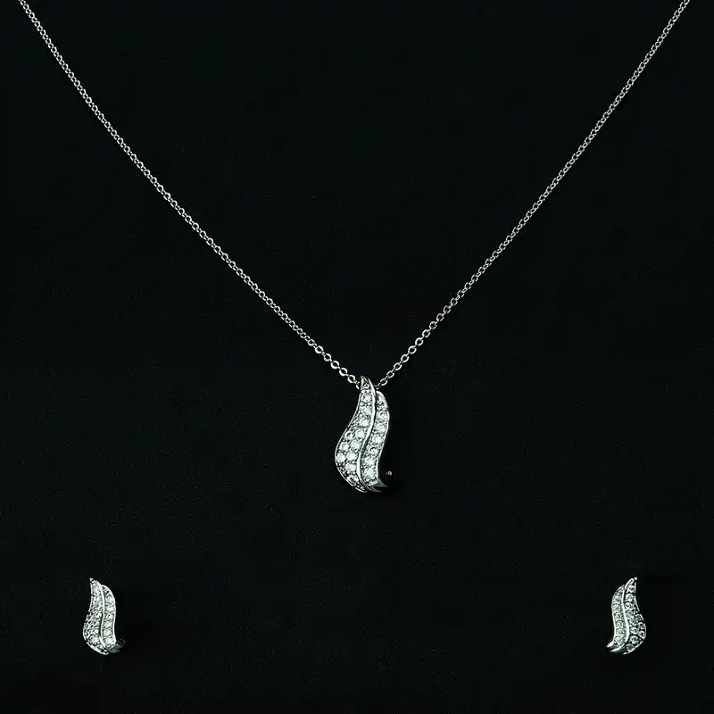 نیم ست زنانه مدل برگ نگین دار رنگ نقره ای