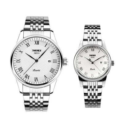 نقد و بررسی ست ساعت مچی عقربه ای زنانه و مردانه اسکمی مدل 9058S توسط خریداران