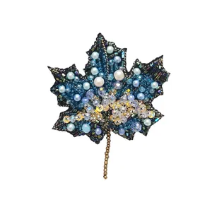 گل سینه زنانه مدل برگ دریایی