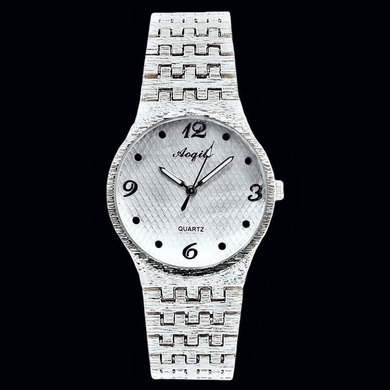 ساعت مچی عقربه ای کوارتز زنانه مدل بند کنگره دار کد 010