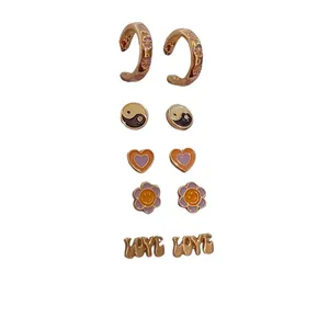 گوشواره زنانه مدل لاو و گل مجموعه 5 عددی