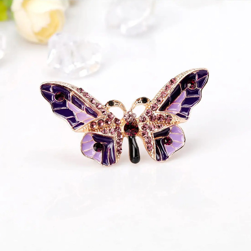 گل سینه زنانه مدل پروانه مجلل نگین دار