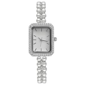 ساعت مچی عقربه‌ای کوارتز زنانه مدل لوکس بند مرواریدی دستبندی کد ۲