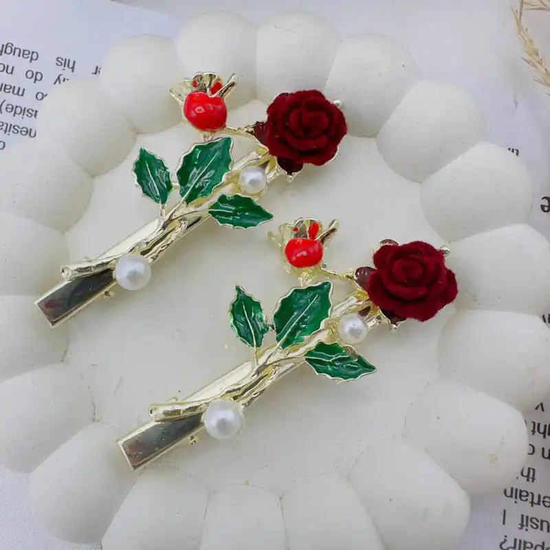 گیره مو زنانه مدل انبری طرح شکوفه انار