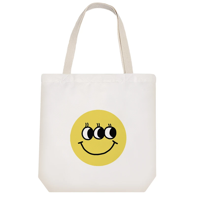 ساک خرید پارچه ای خندالو طرح ایموجی سه چشم مدل توت بگ کد 7107