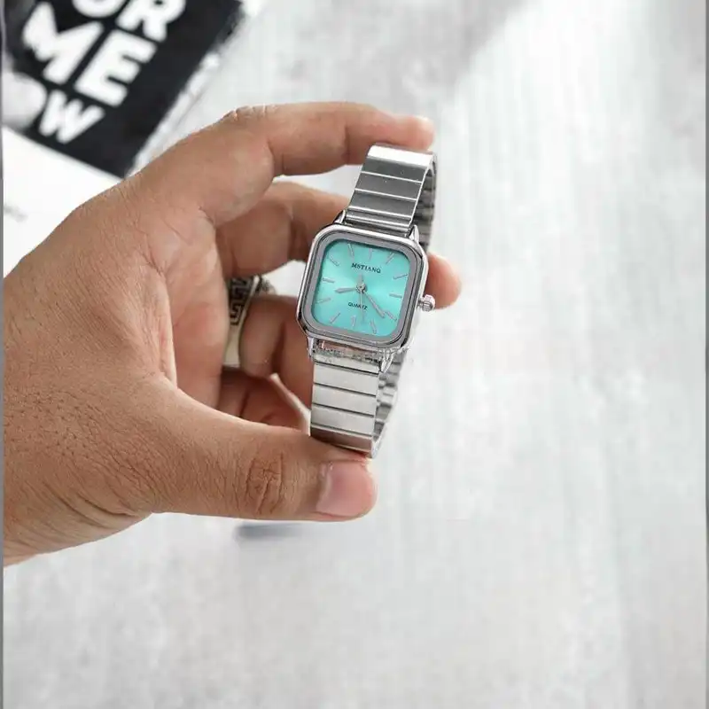 ساعت مچی عقربه ای زنانه مدل بند ریلی 02