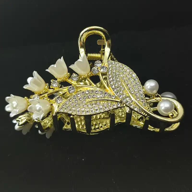 کلیپس مو زنانه مدل فلزی گل نگین دار