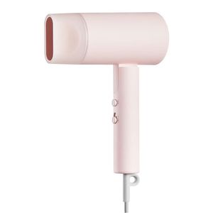 سشوار مسافرتی 1600 وات شیائومی مدل H101 New، موتور AC، وزن 566 گرم، دارای سری متمرکز‌کننده باریک با ویژگی صاف‌کنندگی، با قابلیت فناوری تولید یون