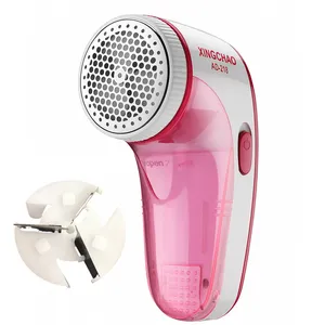 پرزگیر برقی لباس زینگچاو مدل AD-218 به همراه تیغ یدک