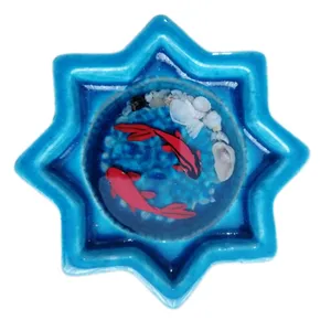 مجسمه سفالی مدل حوض و ماهی رزینی 