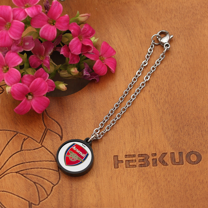 آویز ساعت زنانه ناکسیگو مدل شب تاب طرح آرسنال کد AW7223