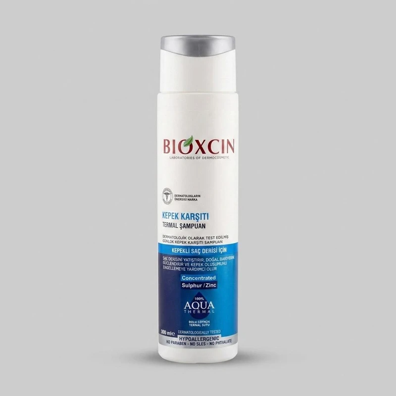 شامپو ضد شوره مو بیوکسین مدل AQUA THERMAL حجم 300 میلی‌لیتر، آبرسان، تقویت‌کننده پیاز مو، فاقد سولفات، مناسب انواع مو، حاوی بیوتین و گوگرد