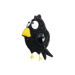 گل سینه زنانه مدل کلاغ 5075