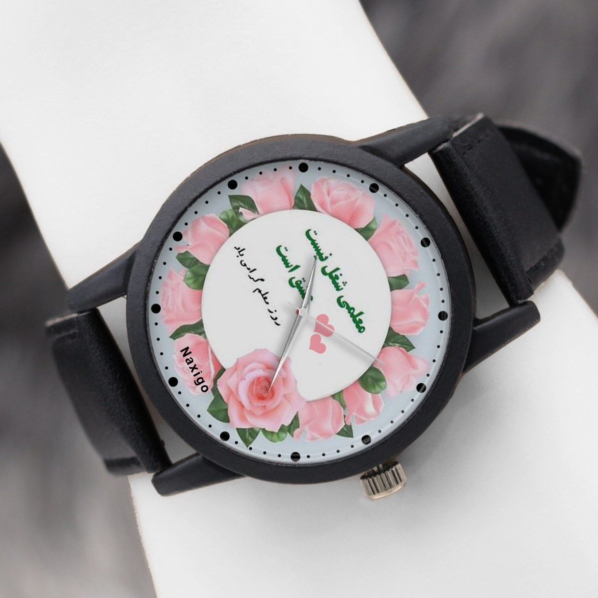 ساعت مچی عقربه ای ناکسیگو مدل روز معلم کد LF12349 ساعت مچی عقربه ای ناکسیگو مدل روز معلم کد LF12349