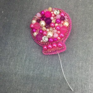 گل سینه زنانه مدل بادکنک