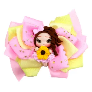 گیره مو دخترانه مدل پاپیون با پیکسل دختر گلدار