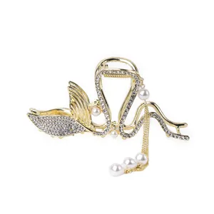 کلیپس مو زنانه مدل دلفینی نگین‌دار