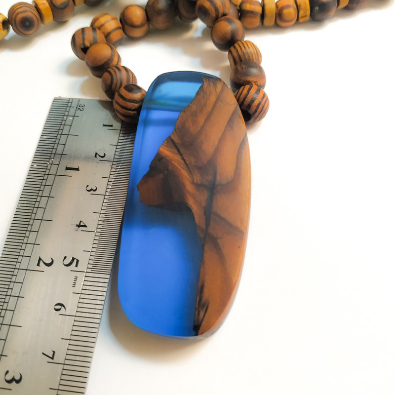 گردنبند دخترانه مدل چوب و رزین گردنبند دخترانه مدل چوب و رزین