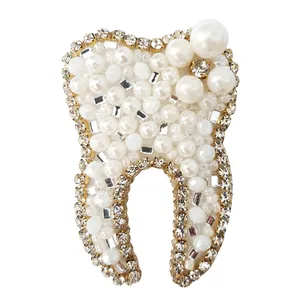 گل سینه زنانه مدل دندان