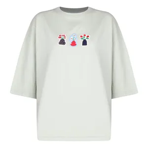 تی‌شرت آستین کوتاه زنانه مدل  باکسی گلدان رنگ سبز روشن