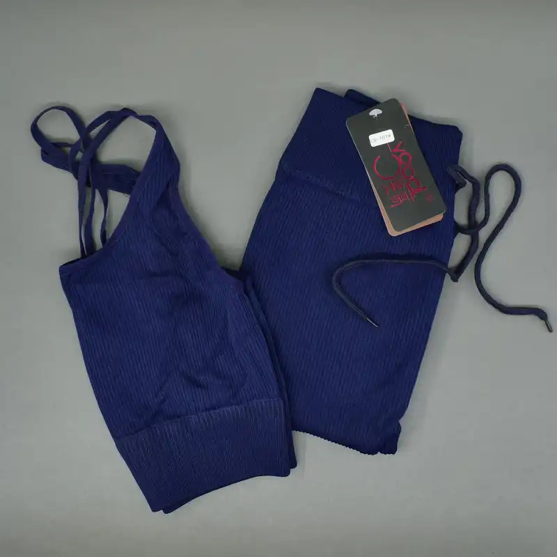 ست نیم تنه و شلوارک ورزشی زنانه مدل راندیک کد 2717