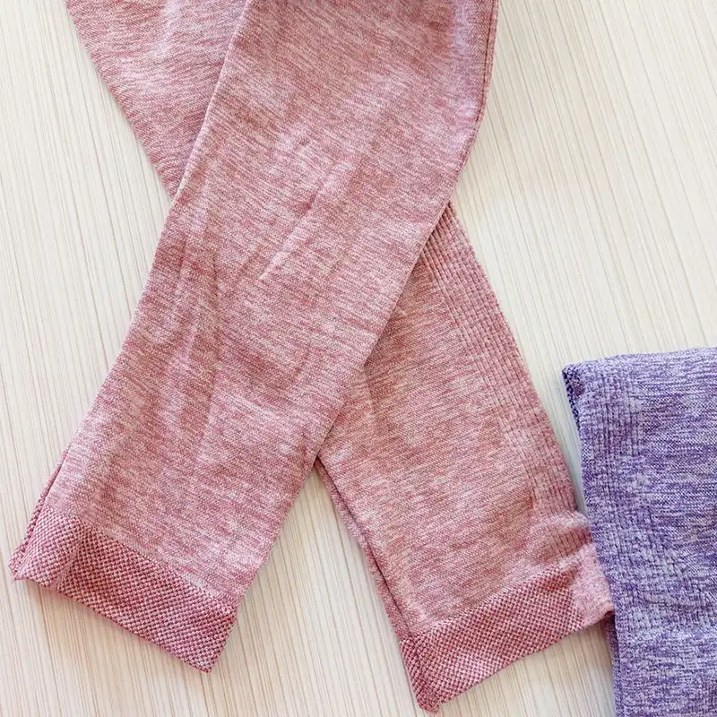 لگینگ ورزشی زنانه مدل سیملس پشت چین دار گنی رنگ صورتی