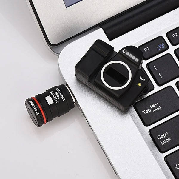 فلش مموری کینگ فست طرح دوربین کنون مدل Canon Camera CM-11 ظرفیت 32 گیگابایت با رابط USB 2.0
