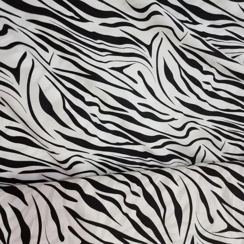 پارچه لباس مدل کودری نخی طرح پلنگی کد ZB