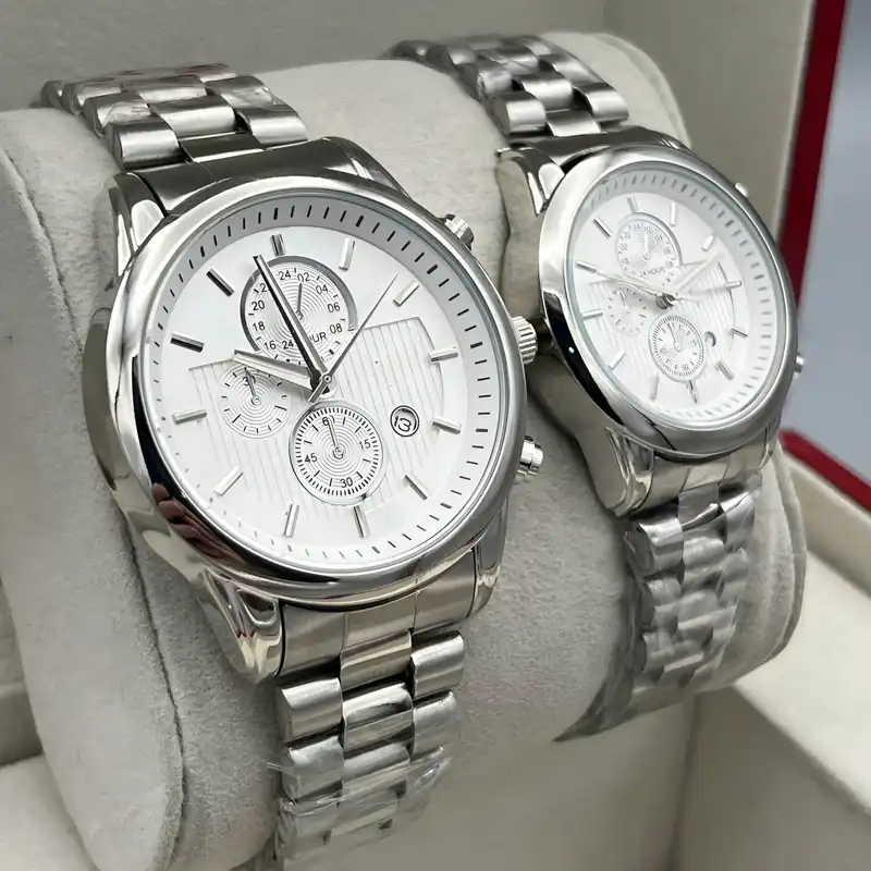 ست ساعت مچی عقربه ای زنانه و مردانه مدل تک موتوره تقویم دار بند فلزی کد 1