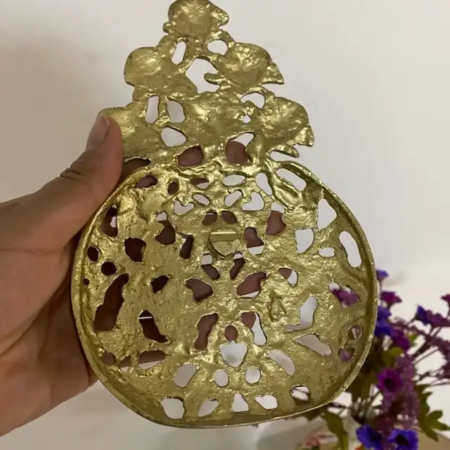 دکوری برنجی مدل دیوارکوب تکریزان