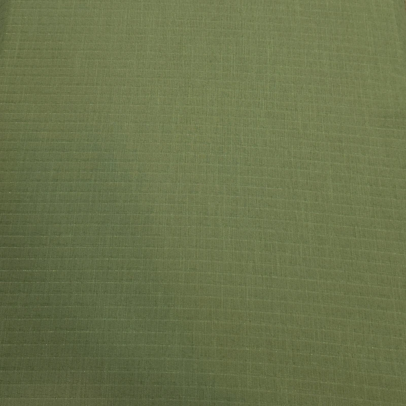 پارچه لباس عرض 1.5 متر مدل شانتون کنف زردار رنگ سبز سدری