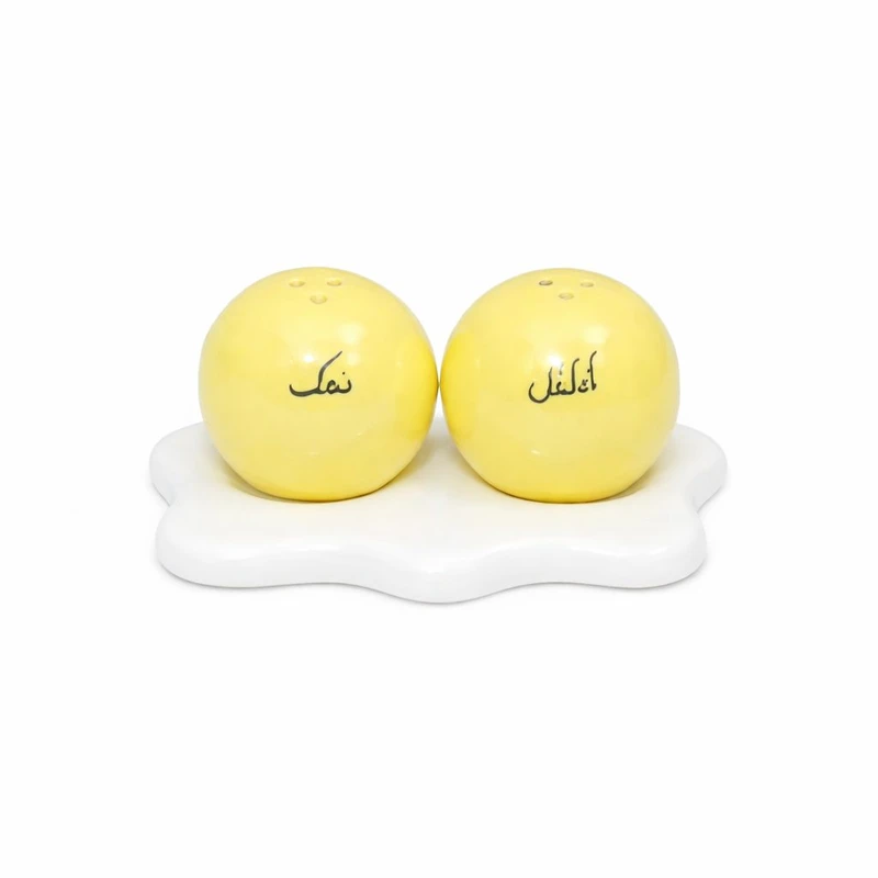 ست نمک‌پاش و فلفل‌پاش مدل نیمرو به همراه استند مجموعه دو عددی