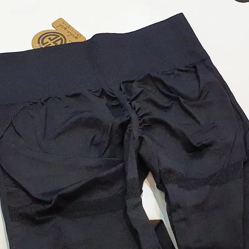 لگینگ ورزشی زنانه مدل فیت لاین سیملس پشت چین دار کمر گنی کد L10