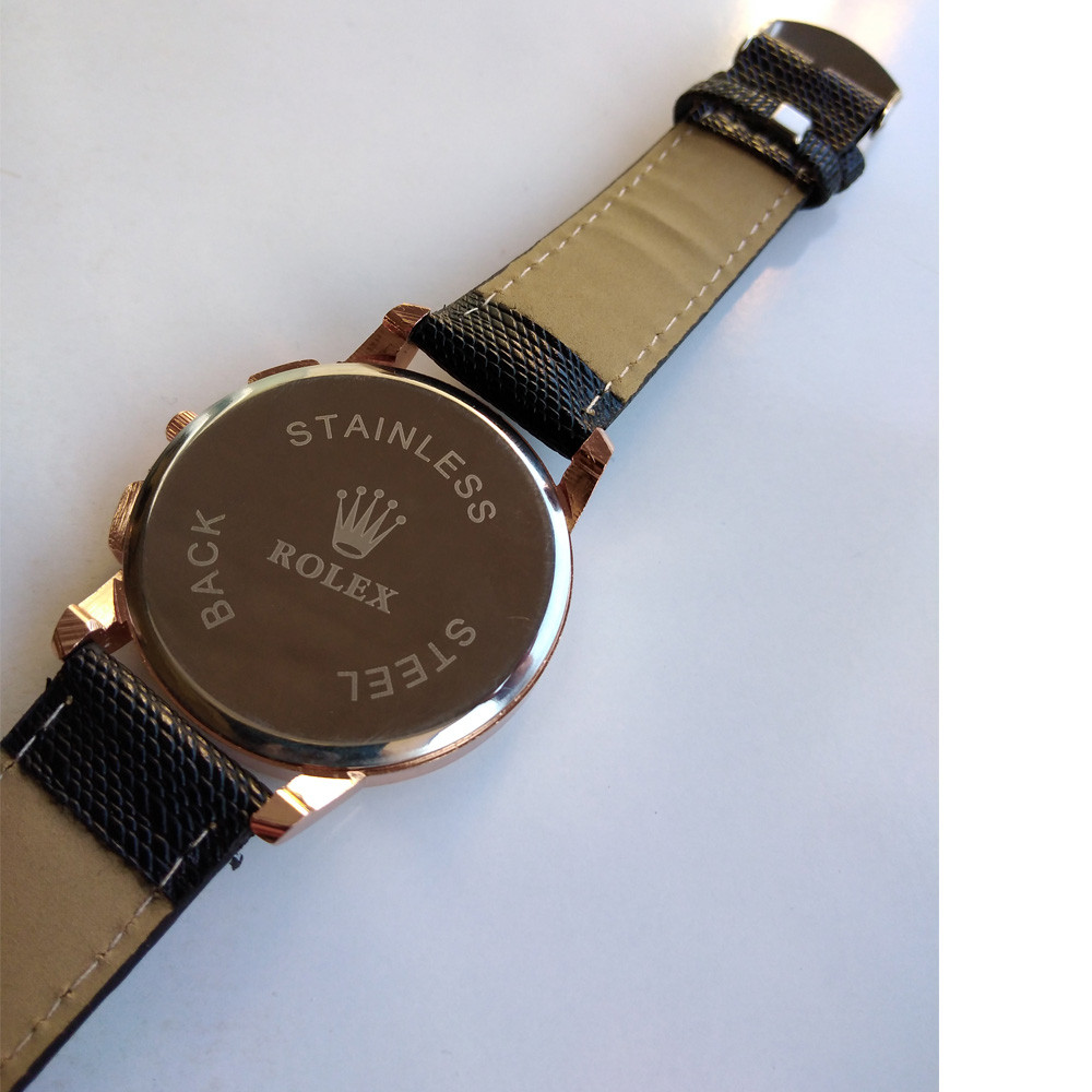 ساعت مچی عقربه ای پسرانه مدل بندچرمی کد 210 ساعت مچی عقربه ای پسرانه مدل بندچرمی کد 210