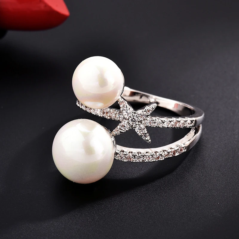 عکس شماره 3 : انگشتر زنانه مدل دو مروارید کد 00683