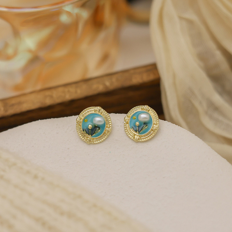 گوشواره میخی زنانه مدل کلاسیک گل میناکاری کد 00976 گوشواره میخی زنانه مدل کلاسیک گل میناکاری کد 00976