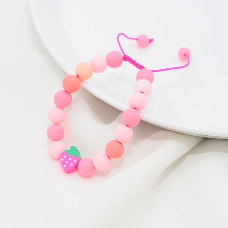 دستبند دخترانه دلنار گالری مدل توت فرنگی پاستیلی