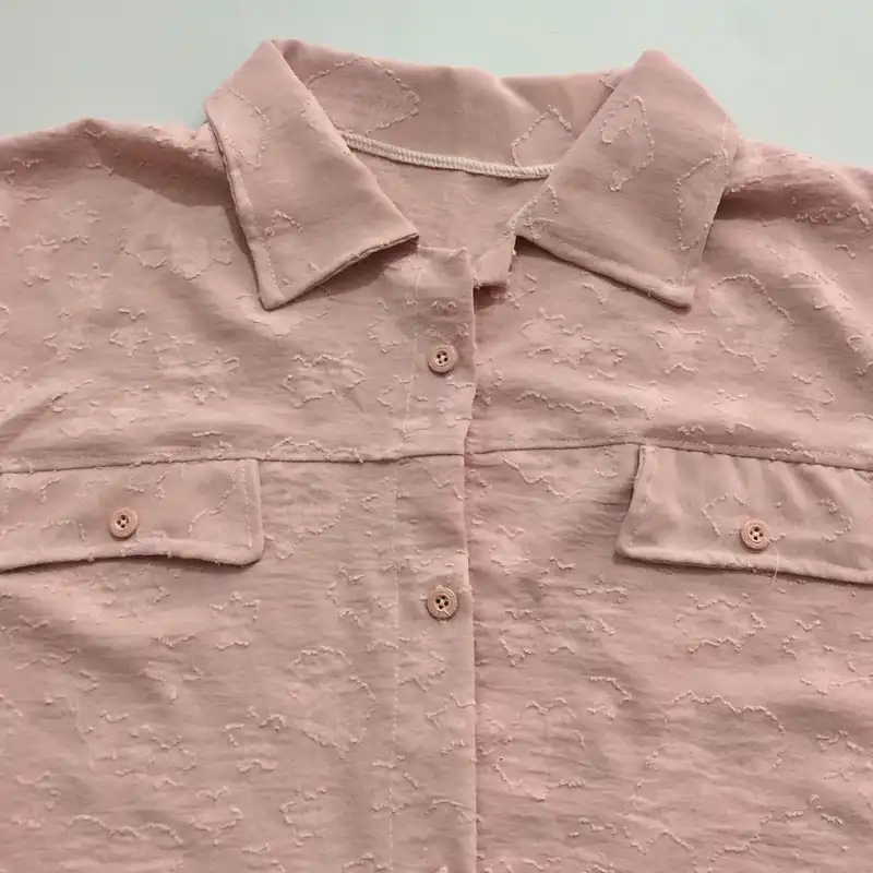 مانتو زنانه مدل نخی ابر و بادی دکمه دار جیب نما اشکی و خالدار کد tm-2651