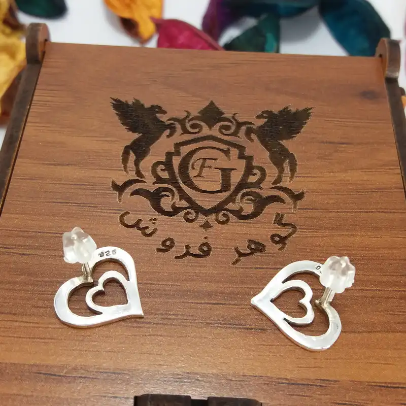 گوشواره نقره زنانه مدل قلب تو در تو