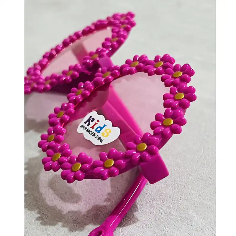 عینک آفتابی بچگانه مدل شفاف طرح گل بابونه 2 کد SO RKH A